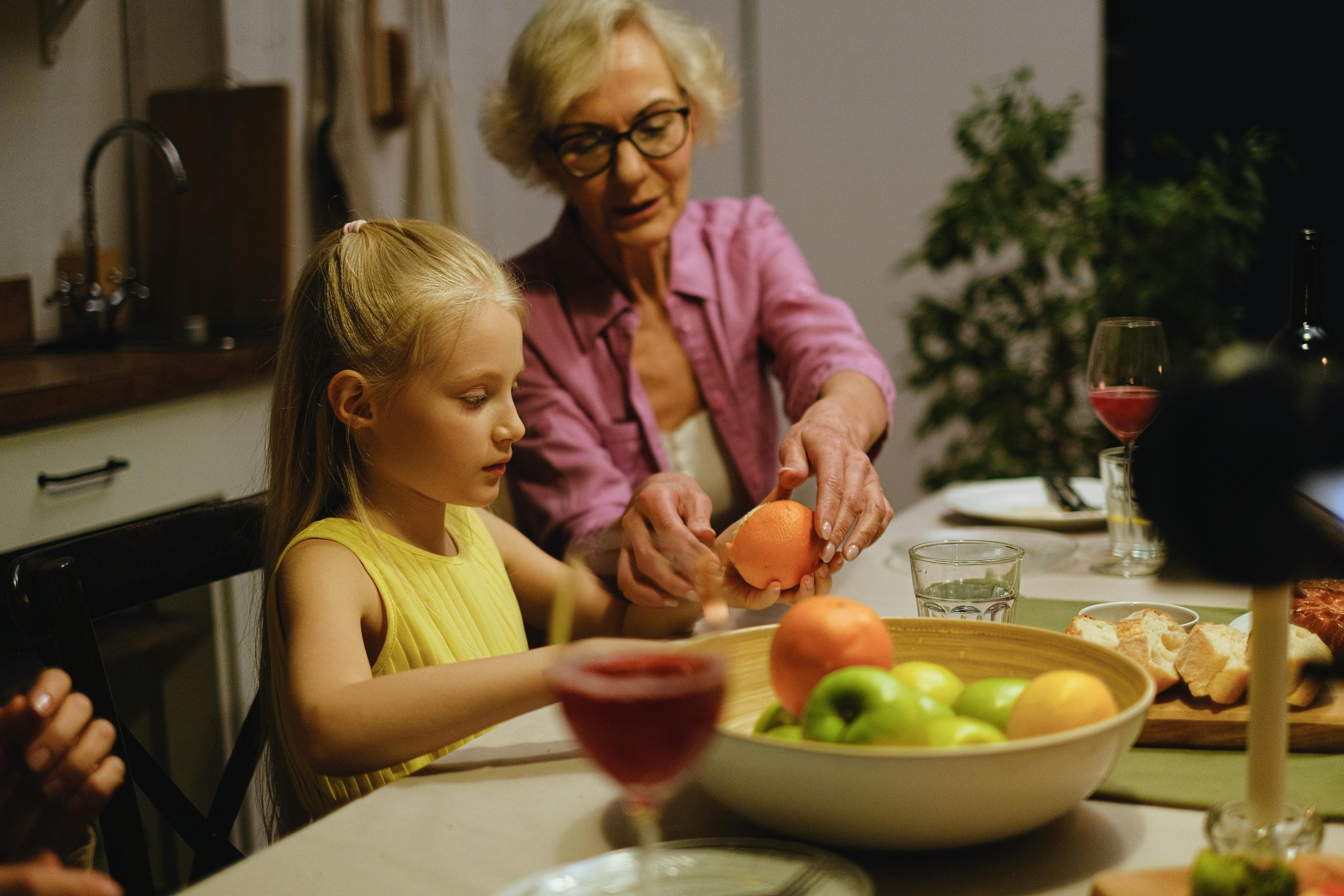 grandmother and youth in kitchen
